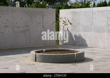 Tuzla, Bosnia and Herzegovina - Oct 4, 2023: This Slana Banja memorial complex remembers Tuzla residents killed or missing during the Bosnian War. Sun Stock Photo