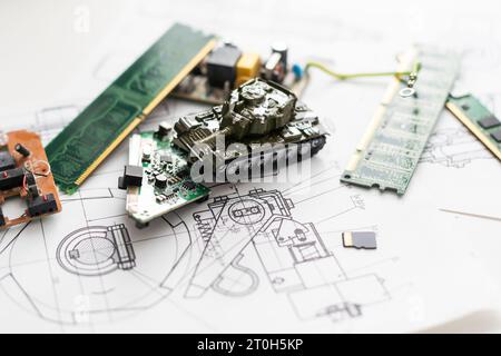 The toy tank is on the table. Children's toy military tank Stock Photo