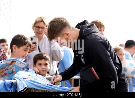 Coventry City's Josh Eccles signs a shirt for a fan ahead of the Sky Bet Championship match at the Coventry Building Society Arena, Coventry. Picture date: Saturday October 7, 2023. Stock Photo