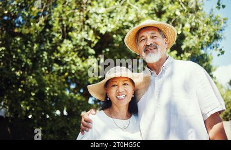 Happy, senior couple and portrait on farm, outdoor and home in countryside with happiness in countryside. Old people, farming and hug with smile for Stock Photo