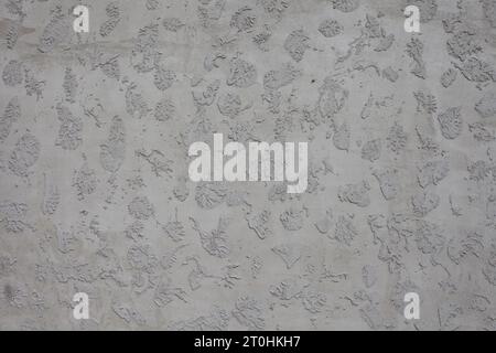 Gray concrete on a textured mesh. Stock Photo