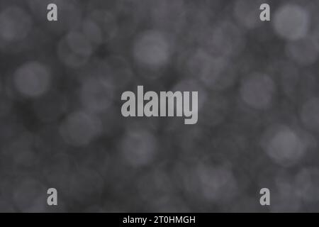 Abstract dark gray background with bokeh Stock Photo