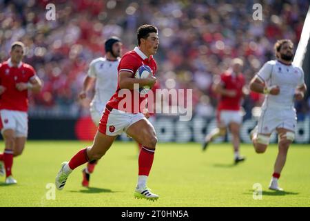 Wales' Louis Rees-Zammit runs with the ball during the Nation's Series rugby union international