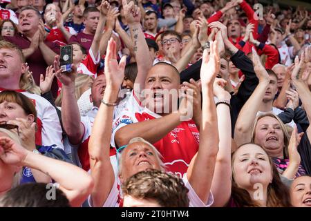 Robins fans cheer on their side during the Betfred Super League Semi Final match Wigan Warriors vs Hull KR at DW Stadium, Wigan, United Kingdom, 7th October 2023  (Photo by Steve Flynn/News Images) Stock Photo