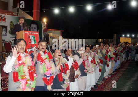 Pashtunkhwa Milli Awami Party (PKMAP) leader, Khushal Khan Kakar administrating oath as the newly elected members of Quetta District during oath taking ceremony held in Quetta on Saturday, October 7, 2023. Stock Photo