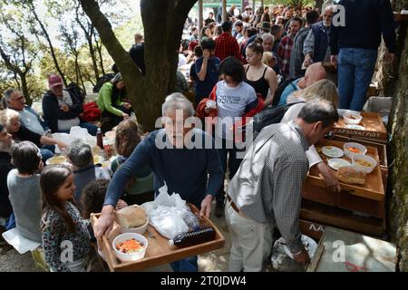 Greek villagers in a 'blue zone' attending the panigiri (village festival) of Agios Isidoros (Saint Isidore), near Pezi, Ikaria, North Aegean, Greece. Stock Photo