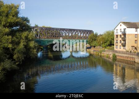 The cast iron railway bridge over the river Nene in Peterborough Stock Photo