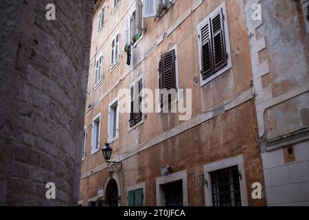 View of an ancient residential building in Kotor Old Town, Montenegro Stock Photo