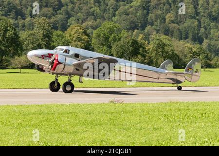 Mollis, Switzerland, August 18, 2023 NC-18125 Lockheed Model 12 Electra Junior aircraft is taxiing on the runway Stock Photo