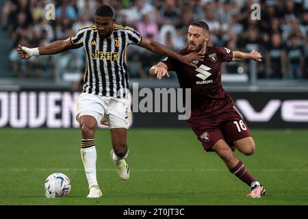 Turin, Italy. 07th Oct, 2023. Gleison Bremer Silva Nascimento of Juventus FC and Nikola Vlasic of Torino Calcio compete for the ball during the Serie A football match between Juventus FC and Torino FC at Juventus stadium in Turin (Italy), October 6th, 2023. Credit: Insidefoto di andrea staccioli/Alamy Live News Stock Photo