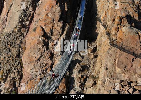 Hir, Ardabil, Iran. 5th Oct, 2023. A general view of the arched glass suspension bridge in the Hir recreation area near Ardabil city. With its 208 meters in length, 1.5 meters in width, and 100 meters in height, the bridge is a frequented place for tourists. (Credit Image: © Rouzbeh Fouladi/ZUMA Press Wire) EDITORIAL USAGE ONLY! Not for Commercial USAGE! Stock Photo