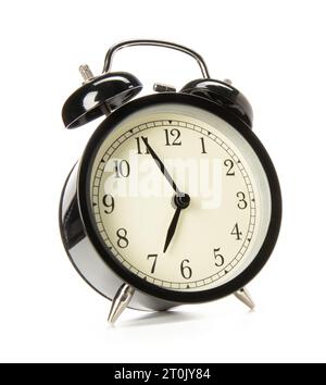 Old-fashioned alarm clock on white background Stock Photo