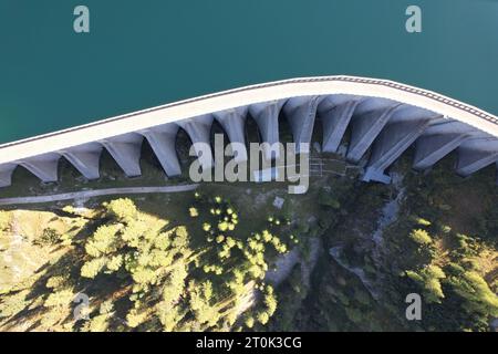 Fedaia Lake,Lago di Fedaia,Beautiful aerial landscape view of Italian Dolomites-with mountain meadows,lakes and rocky and sharp mountain tops,Dolomite Stock Photo