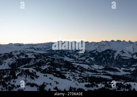 Aerial view of the Alps are the highest and most extensive mountain range system that lies entirely in Europe stretching approximately 4k snapshot of Stock Photo