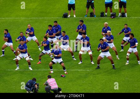 LILLE, FRANCE - OCTOBER 7: The Siva Tau of Samao, Jordan Lay of Samao, Sama Malolo of Samao, Michael Allaalatoa of Samao, Sam Slade of Samao, Brian Alainu'U'Ese of Samao, Theo McFarland of Samao, Fritz Lee of Samao, Steven Luatua of Samao, Jonathan Taumateine of Samao, Lima Sopoaga of Samao, Neria Fomai of Samao, Danny Toala of Samao, Tumua Manu of Samao, Nigel Ah-Wong of Samao, Duncan Paia'Aua of Samao, Seilala Lam of Samao, James Lay of Samao, Paul Alo Emile of Samao, Sootala Fa'a'so'o of Samao, Alamanda Motuga of Samao, Melani Matavao of Samao, Christian Leali'Fano of Samao, Miracle Fai'il Stock Photo