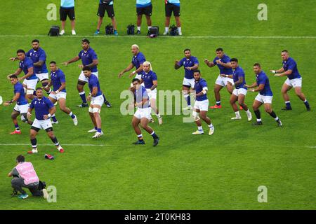 LILLE, FRANCE - OCTOBER 7: The Siva Tau of Samao, Jordan Lay of Samao, Sama Malolo of Samao, Michael Allaalatoa of Samao, Sam Slade of Samao, Brian Alainu'U'Ese of Samao, Theo McFarland of Samao, Fritz Lee of Samao, Steven Luatua of Samao, Jonathan Taumateine of Samao, Lima Sopoaga of Samao, Neria Fomai of Samao, Danny Toala of Samao, Tumua Manu of Samao, Nigel Ah-Wong of Samao, Duncan Paia'Aua of Samao, Seilala Lam of Samao, James Lay of Samao, Paul Alo Emile of Samao, Sootala Fa'a'so'o of Samao, Alamanda Motuga of Samao, Melani Matavao of Samao, Christian Leali'Fano of Samao, Miracle Fai'il Stock Photo