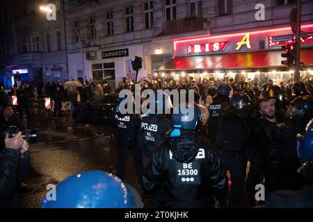 Berlin, Germany. 07th Oct, 2023. Demonstrators and police forces clash in the Neukölln district. About 50 people gathered in Berlin's Neukölln district late Saturday night for what police said was a pro-Palestinian demonstration. Police checked the people and took appropriate measures, a police spokesman said when asked. Israel has been under attack by the Islamist Hamas since Saturday morning. Credit: Paul Zinken/dpa/Alamy Live News Stock Photo