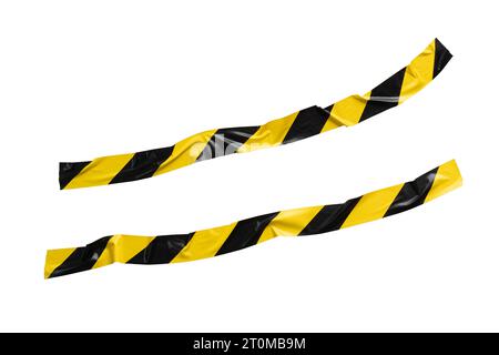 Non straight yellow and black barricade tape on white background with clipping path Stock Photo