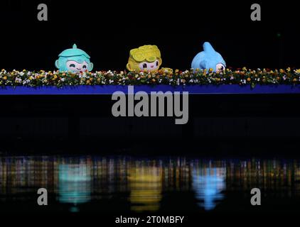 Hangzhou, China's Zhejiang Province. 8th Oct, 2023. Mascots of the Hangzhou Asian Games are seen before the Team Free Routine of Artistic Swimming at the 19th Asian Games in Hangzhou, east China's Zhejiang Province, Oct. 8, 2023. Credit: Wang Kaiyan/Xinhua/Alamy Live News Stock Photo