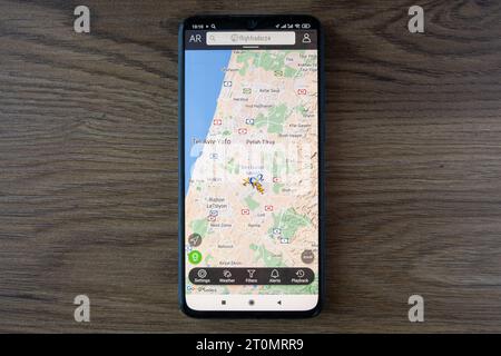 Batumi, Georgia - October 8, 2023: Flights and air traffic over Israel on Flightradar24 app on mobile phone. All planes were canceled due to the Stock Photo