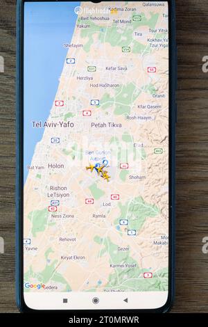 Batumi, Georgia - October 8, 2023: Flights and air traffic over Israel on Flightradar24 app on mobile phone. All planes were canceled due to the Stock Photo