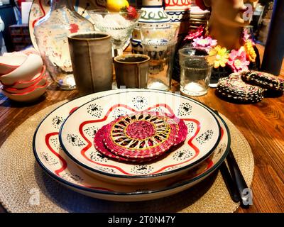 a setup for decoration purposes with plates and cups, close up image from the top Stock Photo