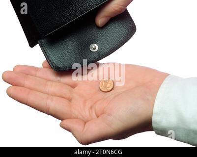 Financial distress, hand holds the last penny from the wallet Stock Photo