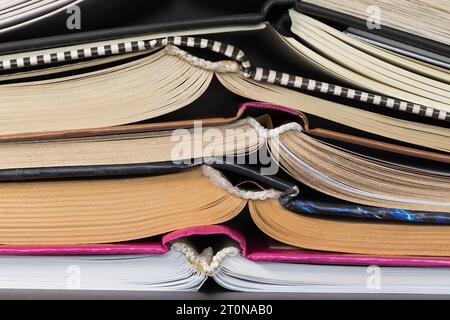 Stack of open books. Side view. Close-up Stock Photo