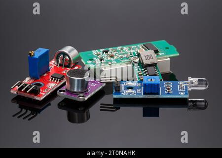 A set of various additional sensor modules for projects using Arduino. Close-up on a gray background. Stock Photo