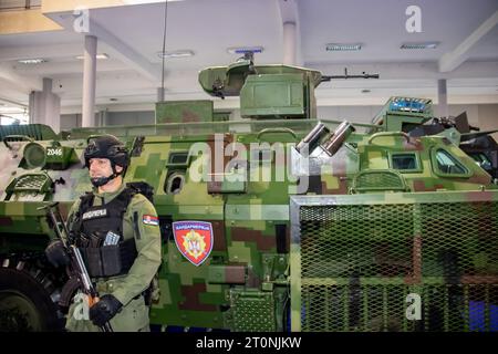 Member of special Serbian forces anti-terrorist soldier under full military equipment with automatic riffle and bullet proof west and helmet Stock Photo