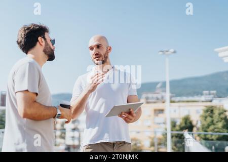 Successful Architects Collaborating on Urban Construction Project Stock Photo