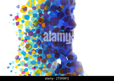 A man's image in vibrant paintography with a painted-circles pattern Stock Photo