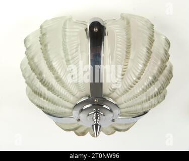 Antique 1930s Art Deco ceiling clam sea shell hanging pale grey glass and chrome lamp Stock Photo