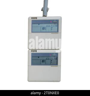 Wall-mounted control panel for a group of industrial air conditioners, isolated on white background. Stock Photo