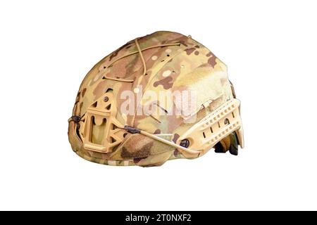 The soldier's helmet, part of the khaki military uniform, is present in the military clothing store, isolated on white background. Stock Photo