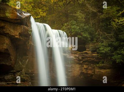 Twin cascades of Douglas Falls cascade over the cliff in Blackwater Canyon trail near Thomas WV Stock Photo