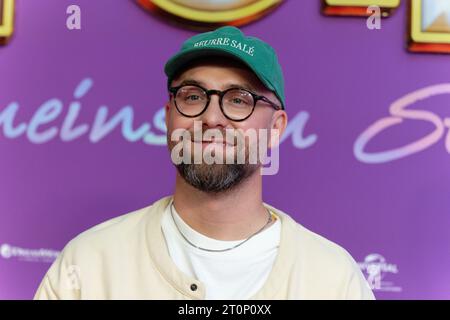 Cologne, Germany. 08th Oct, 2023. Voice actor Mark Forster comes to the premiere of the film 'Trolls - Strong Together'. Credit: Henning Kaiser/dpa/Alamy Live News Stock Photo