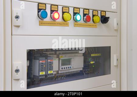 LED lights indicate the status of the electrical circuit Abb ? Schneider on the control panel. The electrical industry relies on advanced technology - Stock Photo