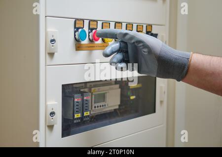 Abb ? Schneider industrial display shows the voltage of the electrical circuit. The electrician installed a new distribution system with an automatic Stock Photo