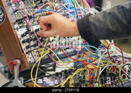 Sound engineer working on a sound mixer in a recording studio, close-up - Moscow, Russia, September 20, 2023 Stock Photo