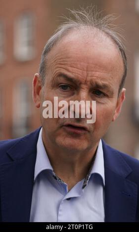 Tanaiste Micheal Martin speaks to the media as he arrives for a meeting at Government Buildings in Dublin to finalise budget details. Picture date: Sunday October 8, 2023. Stock Photo