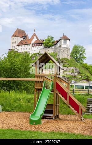 Playground and Castle of Burgdorf along the river Emme high on a hill entrance to Emmental, canton Bern in Switzerland Stock Photo