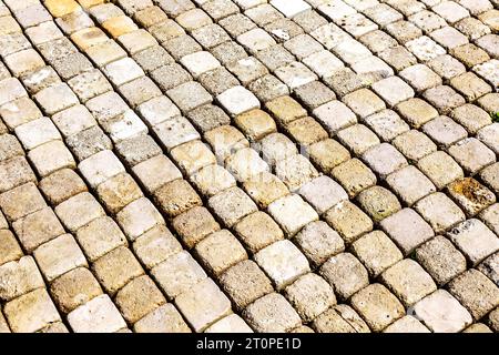 Square shaped stone paving slabs as a creative background, stone texture Stock Photo