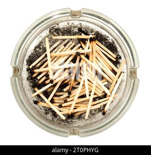 Ashtray with burnt matches on a white background. View from above. Smoking Stock Photo