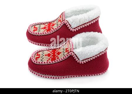 A pair of cozy home slippers isolated on a white background. Stock Photo