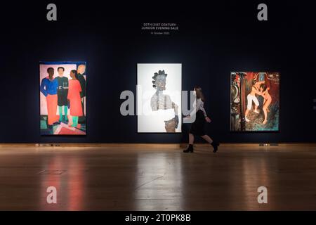 London, UK. 06th Oct, 2023. LONDON, UNITED KINGDOM - OCTOBER 06, 2023: A gallery staff member walks next to paintings by (L-R) Sahara Longe, Party Scene, 2021, estimate £40,000 - 60,000, Amoako Boafo, Soleit, 2019, estimate £200,000 - 300,000 and Jenna Gribbon, Pollyanna Wrestlers, 2018, estimate £80,000 - 120,000 during a photocall at Christie's auction house showcasing the highlights of 20th/21st Century Evening Sale in London, United Kingdom on October 06, 2023. (Photo by WIktor Szymanowicz/NurPhoto) Credit: NurPhoto SRL/Alamy Live News Stock Photo