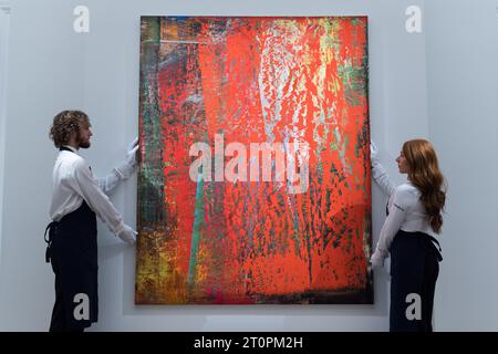 London, UK. 06th Oct, 2023. LONDON, UNITED KINGDOM - OCTOBER 06, 2023: Gallery staff members hold a painting titled ‘Abstraktes Bild' by Gerhard Richter, estimate £16-24 Million, during a photocall at Sotheby's auction house showcasing the highlights of Frieze Week Sales in London, United Kingdom on October 06, 2023. The artworks will be on view at Sotheby's auction house between 7 and 11 October before being offered during The Now and Contemporary Evening auctions on October 12. (Photo by WIktor Szymanowicz/NurPhoto) Credit: NurPhoto SRL/Alamy Live News Stock Photo