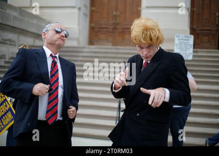 November 2, 2016 - Indianapolis, Indiana, USA: Activists dressed as Mike Pence, left, and Donald Trump dance during the Periods for Politicians formerly Periods for Pence anti-Trump and anti-Pence rally on the steps of the Indiana Statehouse. The rally was titled, The Revolution Will Be Uterized (A Rally in 3 Acts). Stock Photo