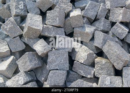 Cobblestones forming a background. Paving stones used in the streets of Brazil. Stock Photo