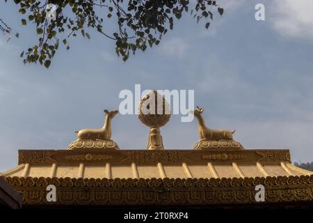 Gajur and deer in the top of the entrance gate to the Buddha Park at Swayambhunath, Kathmandu, Nepal Stock Photo